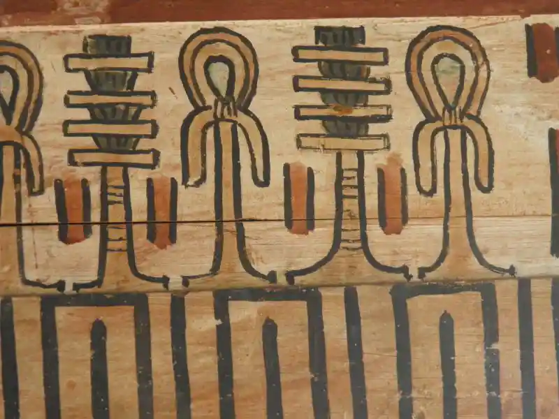 Ankh and Djed on a wooden lid